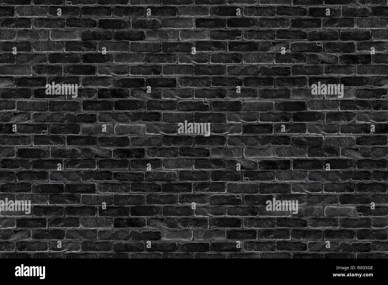 seamless old dark black brick wall infinity texture design pattern background Stock Photo