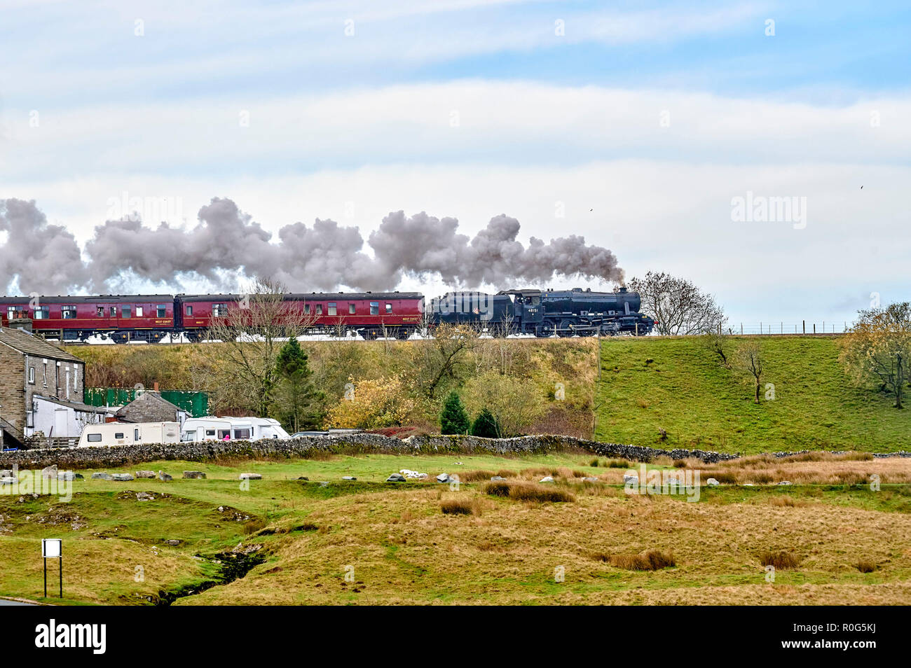 Preserved steam hauled train on the Settle & Carlisle Railway line, Yorkshire Dales National Park, Northern England, UK Stock Photo