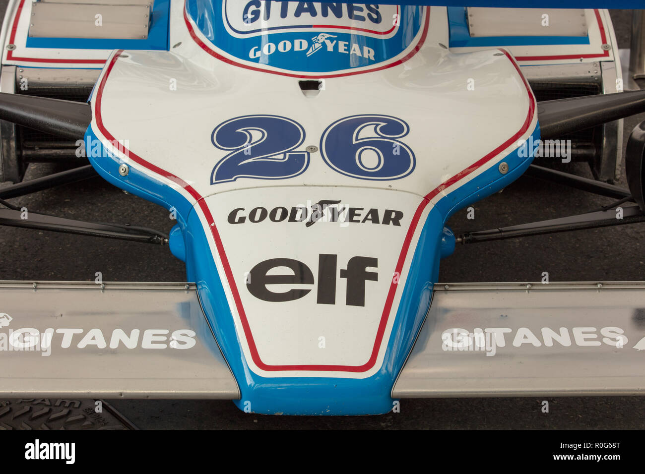Close up of front and bonnet of a classic racing car number 26 is seen with logos of elf, gitanes and goodyear. Stock Photo