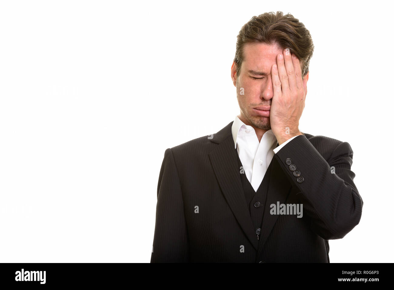 Caucasian businessman looking upset and stressed with failure Stock Photo