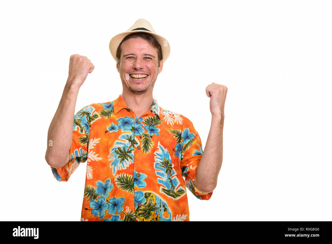 Happy Caucasian man looking excited ready for vacation Stock Photo
