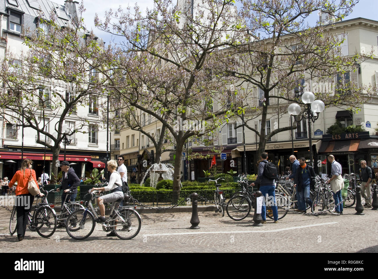 Bikers pause at the Place de la Contrescarpe, the focal point of the Rue Mouffetard district, Paris, France. Stock Photo