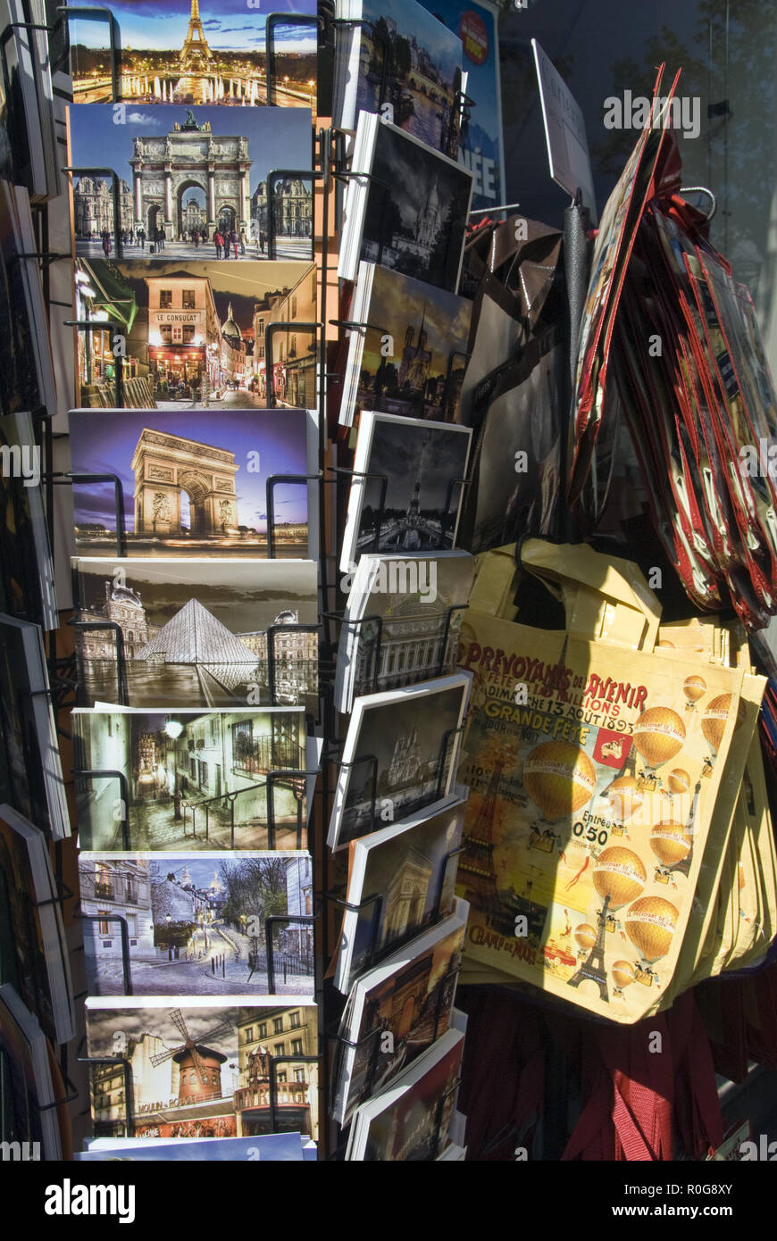 Souvenir postcards and bags for sale at a shop on Rue Mouffetard, a popular street of cafes, bars, souvenir shops, and markets, Paris, France. Stock Photo
