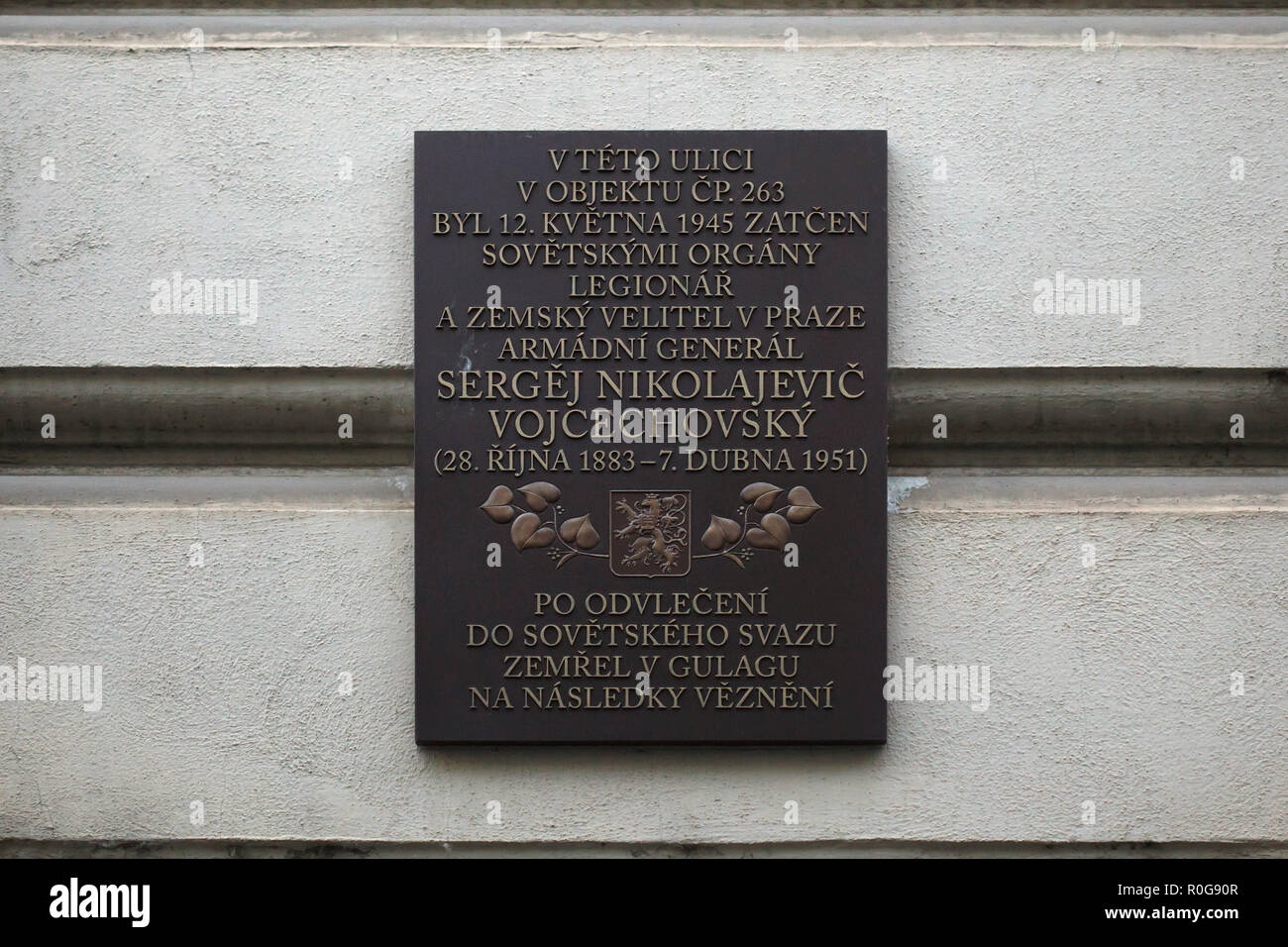 Commemorative plaque next to the house where Czechoslovak general Sergej Vojcechovský (Sergei Wojciechowski) was arrested by the SMERSH on 12 May 1945 in Konviktská Street in Prague, Czech Republic. Sergej Vojcechovský was a military commander in the White Army during the Russian Civil War and then lived in exile in Czechoslovakia and served in the Czechoslovak Army. He was arrested by the SMERSH (Soviet military counterintelligence service) and sent to Moscow shortly after the Red Army liberated Prague in May 1945. He died in prison on 7 April 1951 in the Ozerlag Labour Camp of the Gulag in T Stock Photo