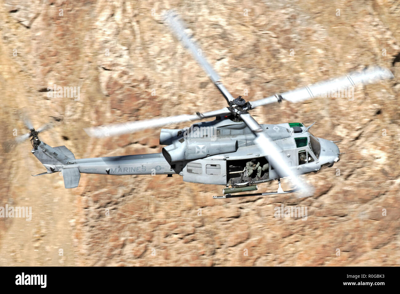 Bell UH-1Y Venom flown by US. Marines helicopter squadron HMLA-369 'Gunfighters' flying through Star Wars Canyon in 2018 Stock Photo