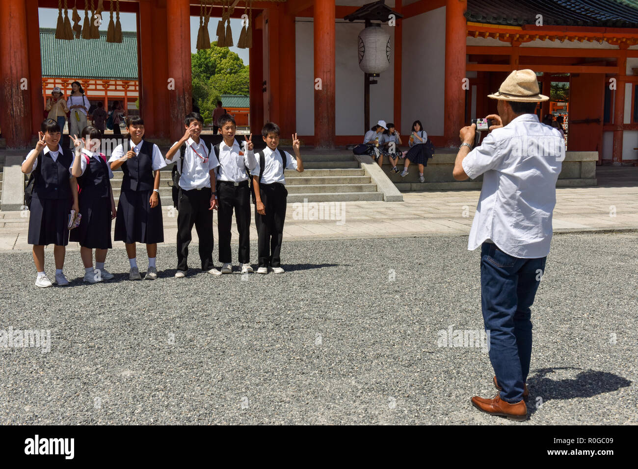 Teacher taking picture of students , Kyoto, Japan Stock Photo