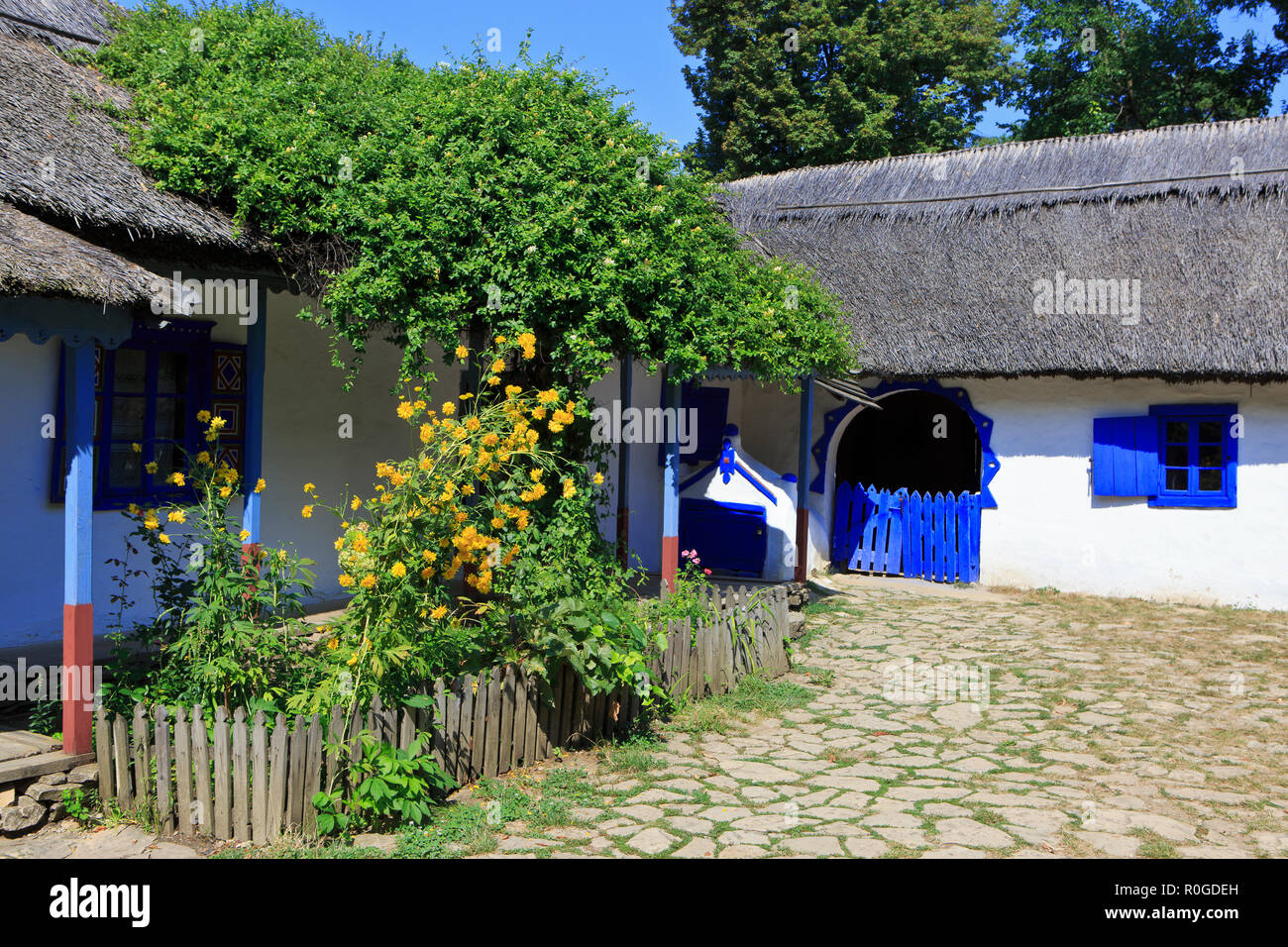 A beautiful traditional farmhouse at the Dimitrie Gusti National Village Museum in Bucharest, Romania Stock Photo