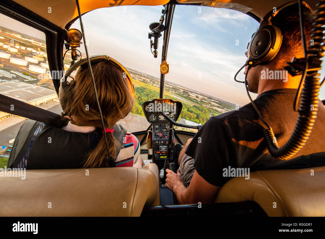 Flying together with kids in helicopter tour Stock Photo
