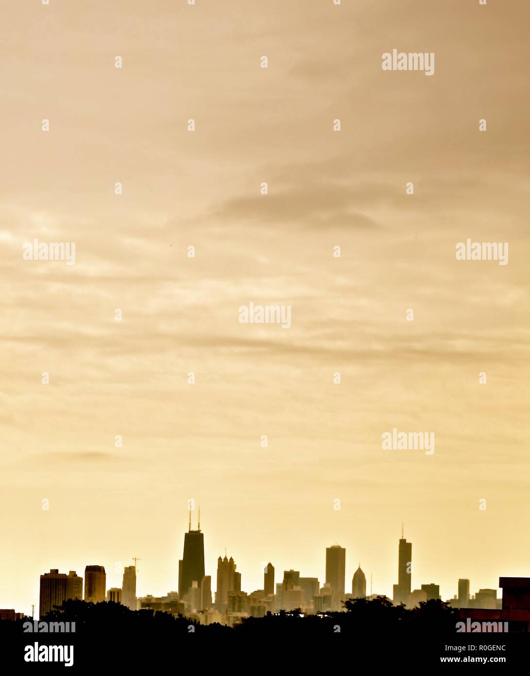 Chicago skyline is one of the tallest skylines in the world, boasting 4 of its tallest skyscrapers in the USA. Long Exposure was used on night photos. Stock Photo