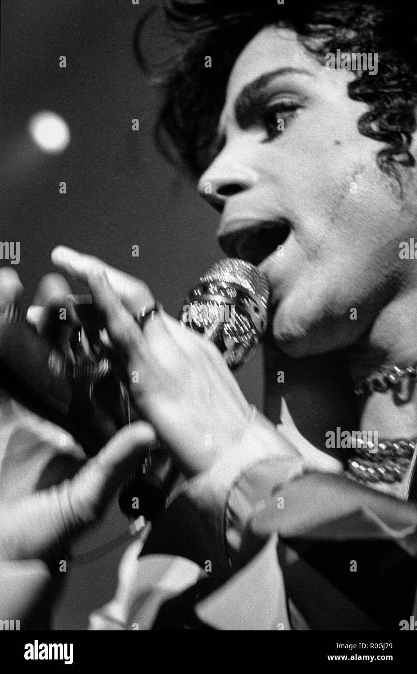 Prince onstage with gun microphone, performing at a concert in Chicago, in 1993. Stock Photo