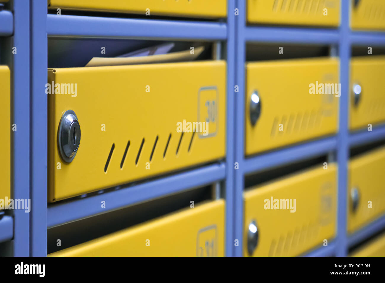 metal mailboxes in an apartment building. Cool mailboxes Stock Photo