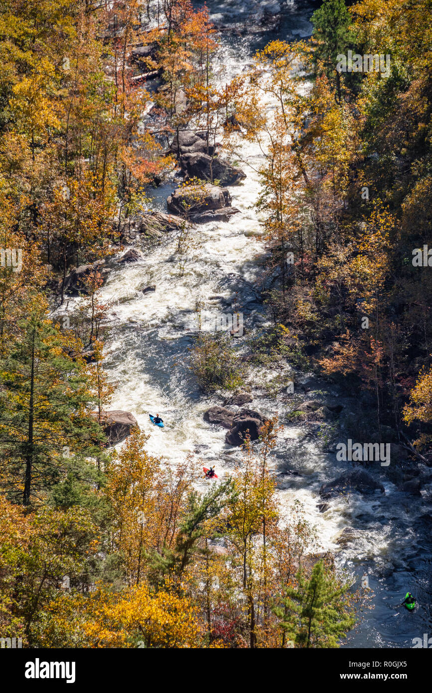 Three whitewater kayakers on the Tallulah River in Northeast Georgia's Tallulah Gorge State Park. (USA) Stock Photo
