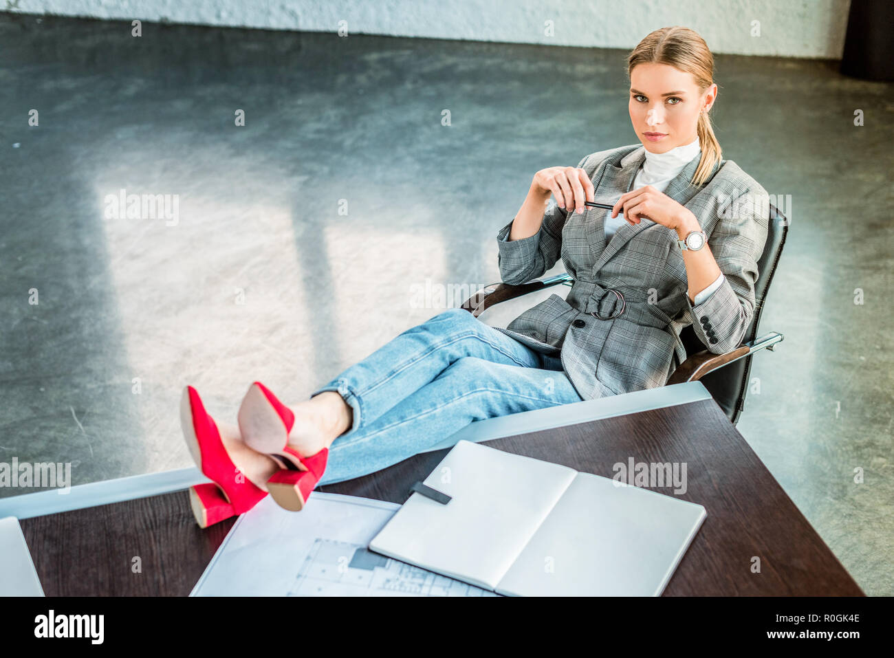 Legs on table in office hi-res stock photography and images - Alamy
