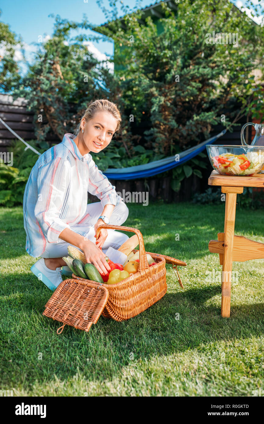 Alone woman picnic basket hi-res stock photography and images - Alamy