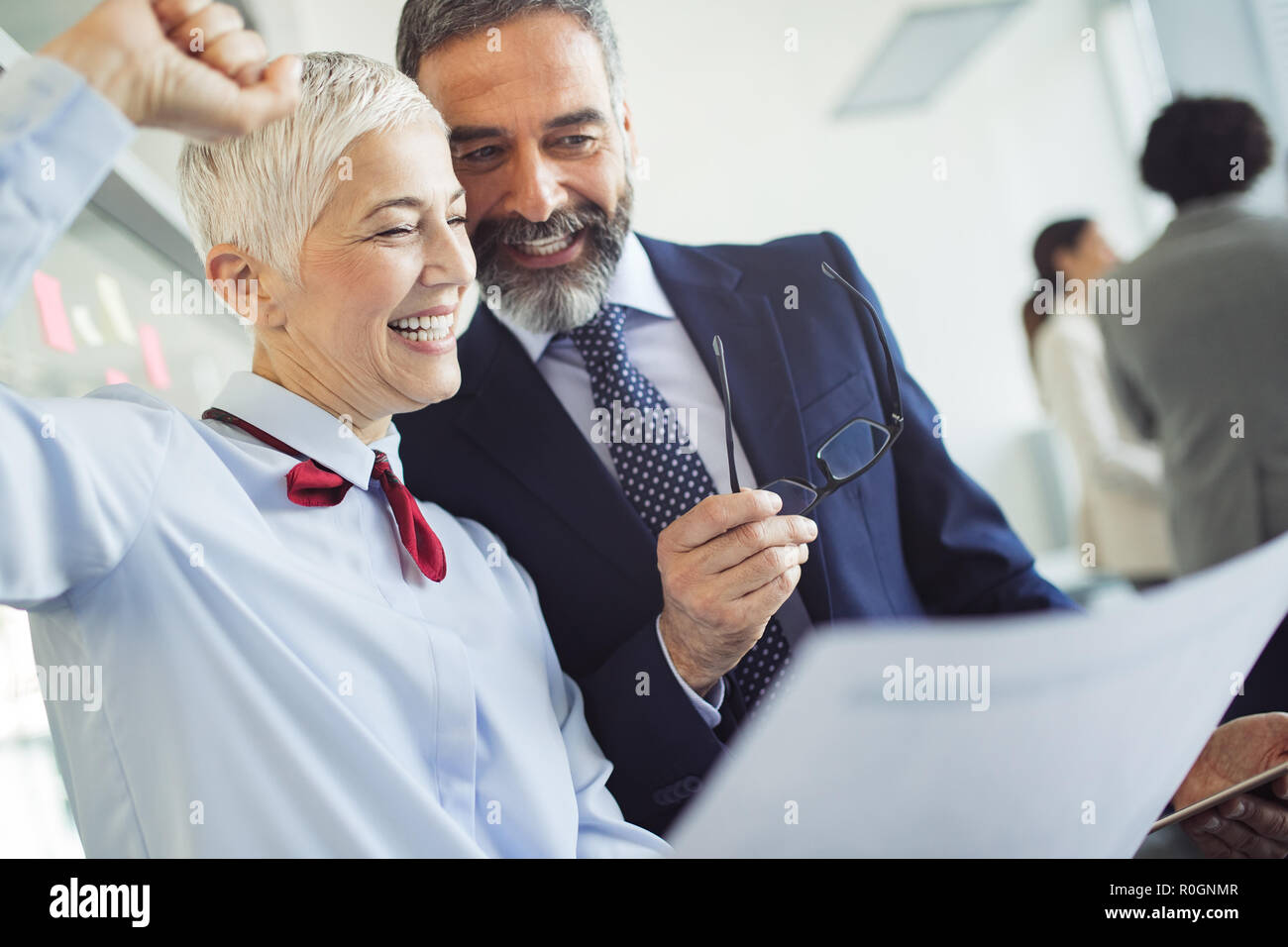 Senior business accountants working together at modern office Stock Photo