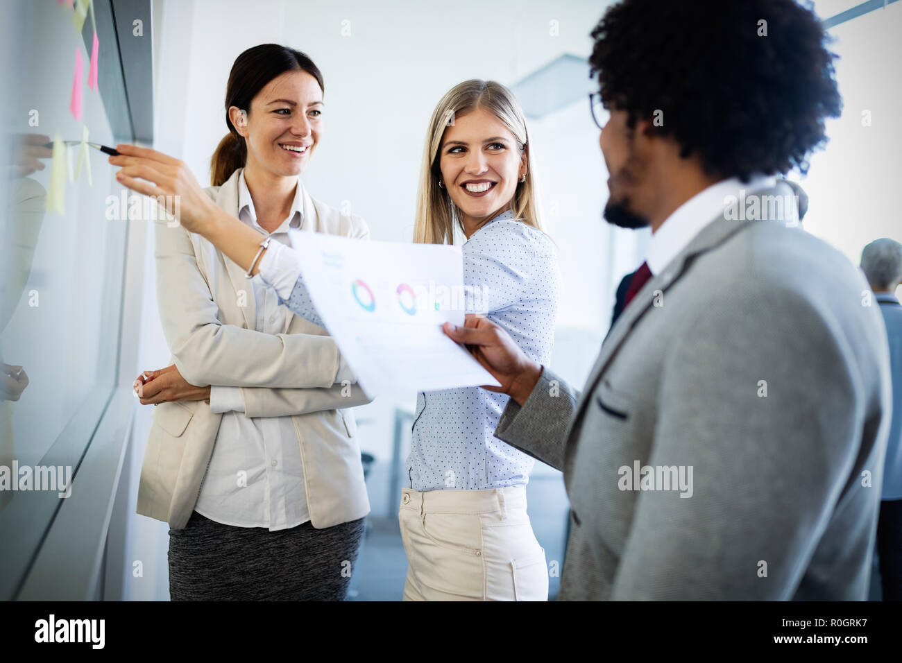 Group of business people. Business people sharing their ideas. Stock Photo