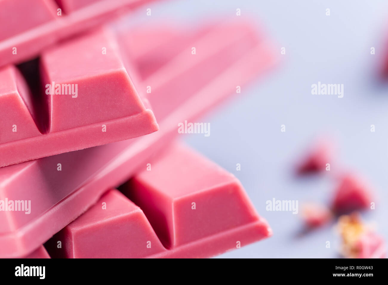 Finger Ruby Chocolate Bar made from ruby cocoa bean. New dimension of chocolate sweets. Stock Photo