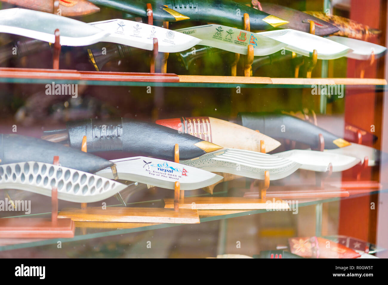 Pokhara, Nepal - July 31, 2018 : Kukri or khukuri knives as souvenirs in shop window in Pokhara town, are considered as the national knife and icon of Stock Photo