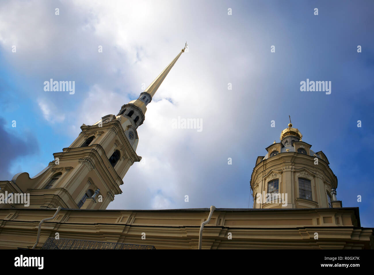 Peter and Paul cathedral in Saint'Petersburg, Russia, burial place of russian tzars, bottom view against cloudy sky Stock Photo