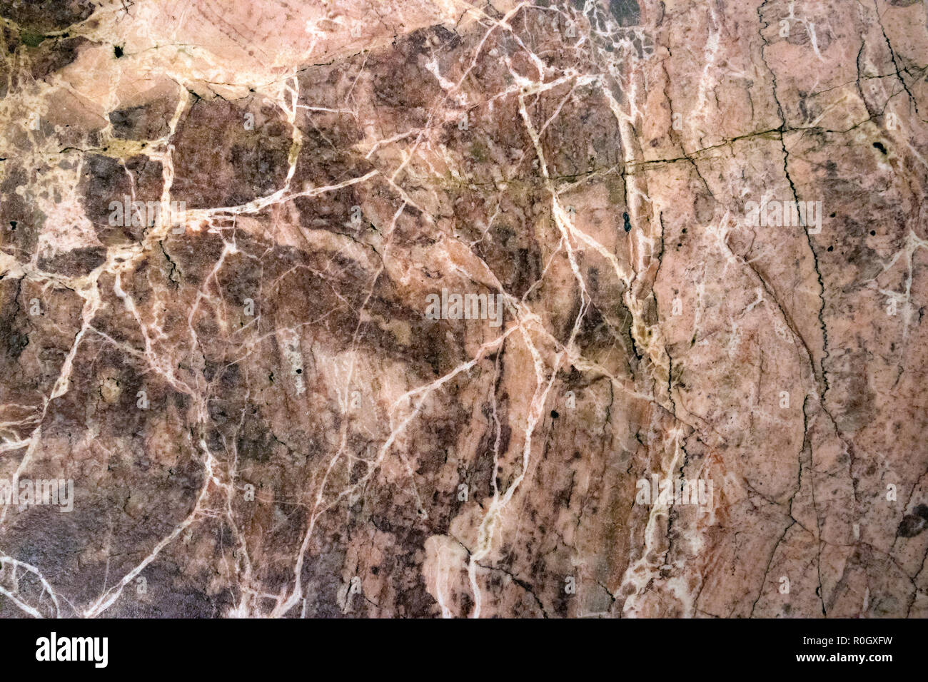 Multicolored layered marble texture with different veins and scratches, may be used as background Stock Photo
