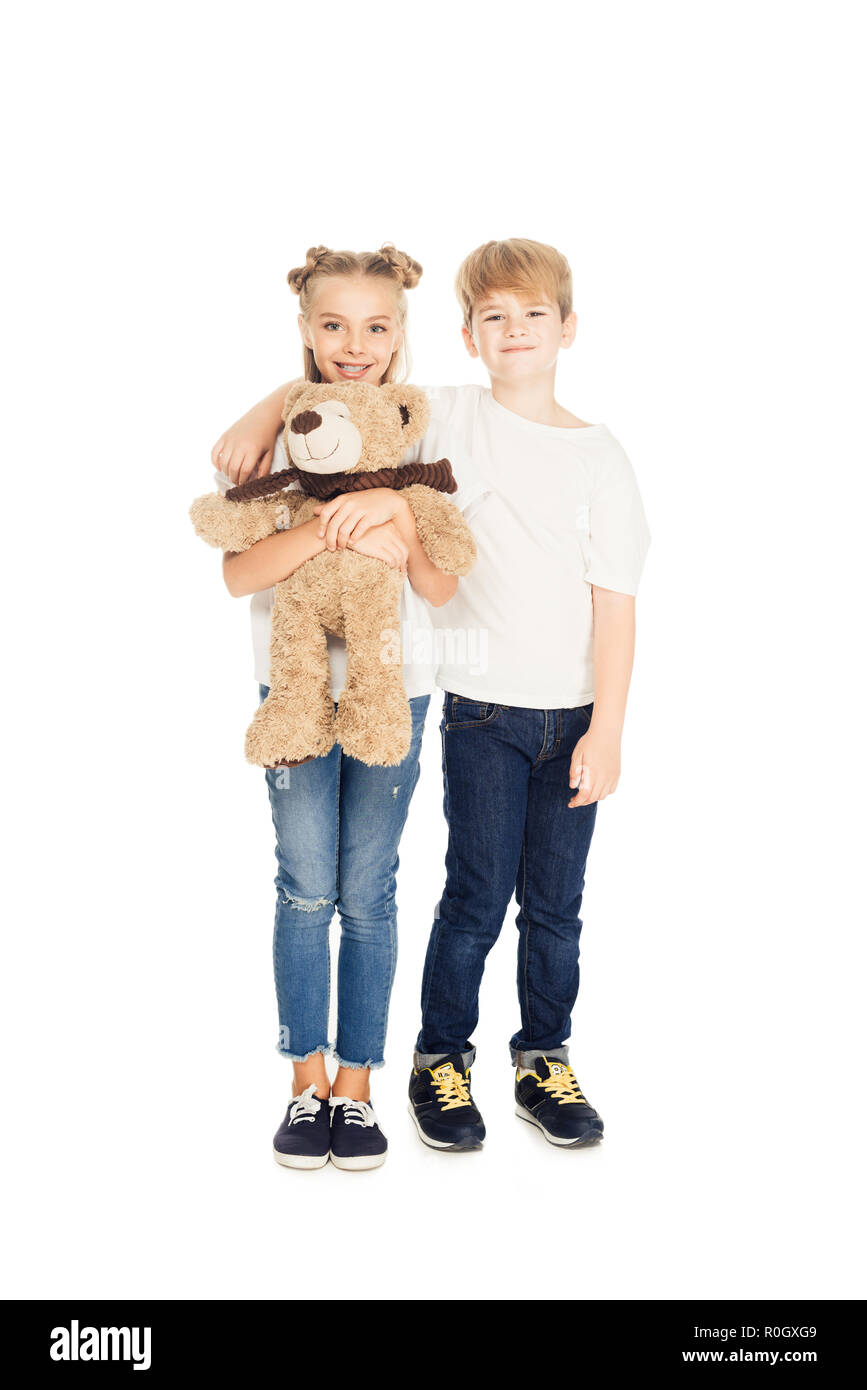 Boy hugging teddy bear Cut Out Stock Images & Pictures - Alamy