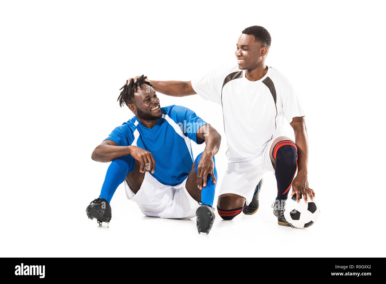 happy african american soccer players having fun isolated on white