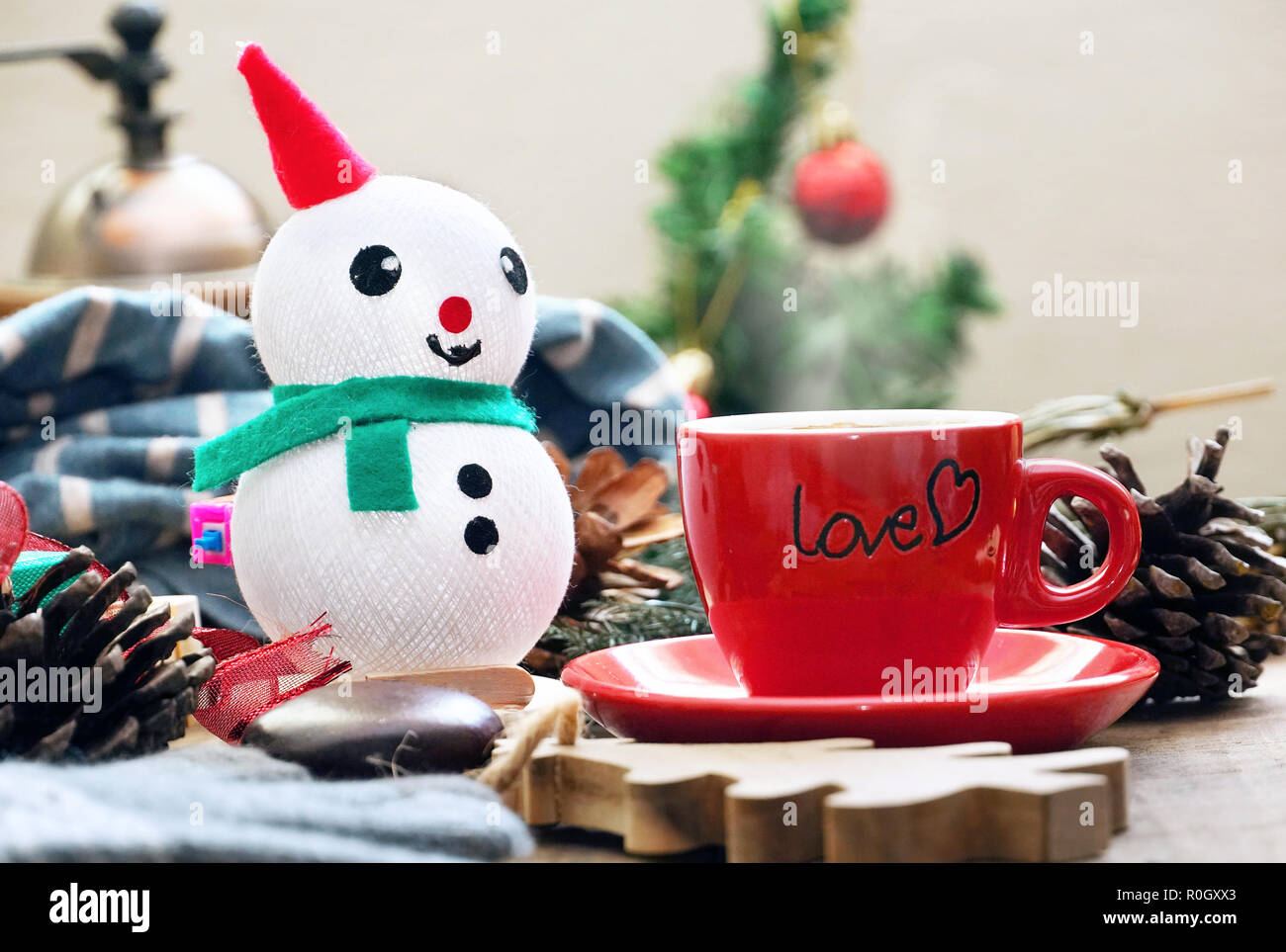 Red Coffee Cup With Snowman Decorate For Christmas Theme Stock