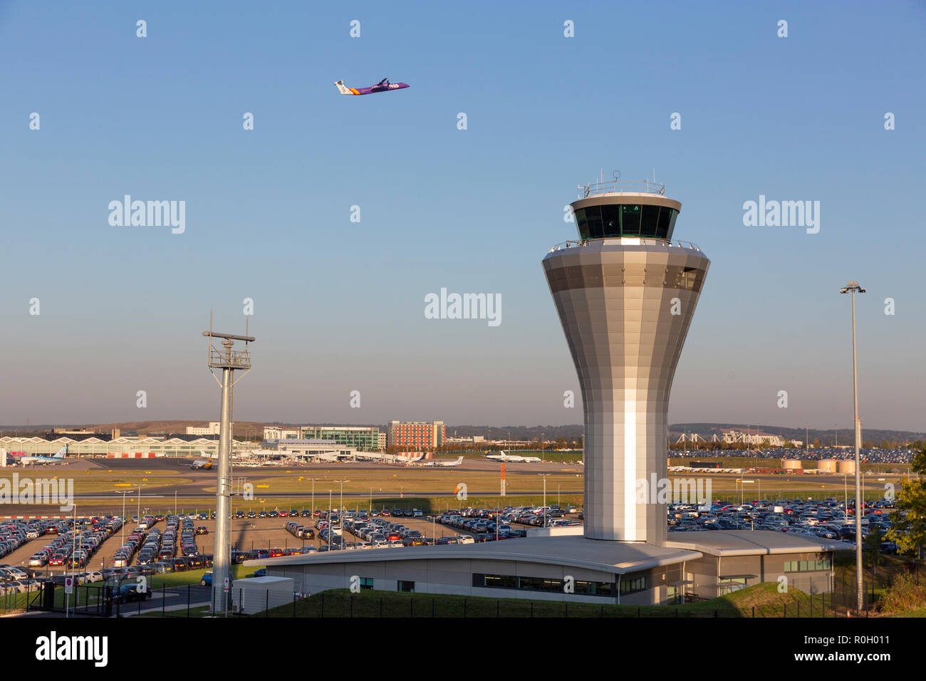 BIRMINGHAM, UK - OCTOBER 17, 2018: General wide view of Birmingham Airport in the Midlands, England with a Flybe aircraft passing the distinctive, met Stock Photo