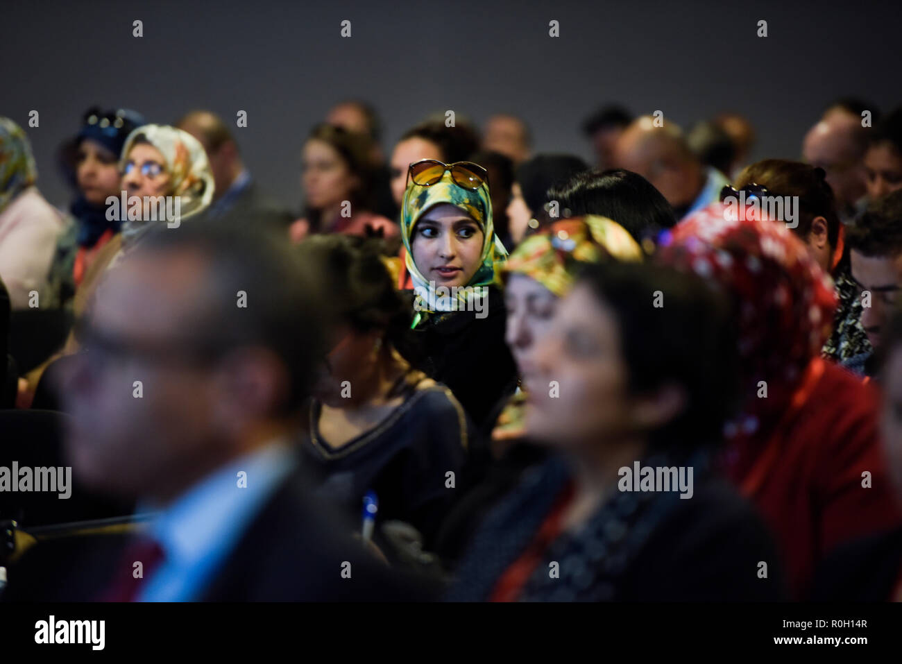 Focus on a North African woman attending the United Nations Climate Change Conference Marrakesh MED COP 2016 conference in Morocco Stock Photo