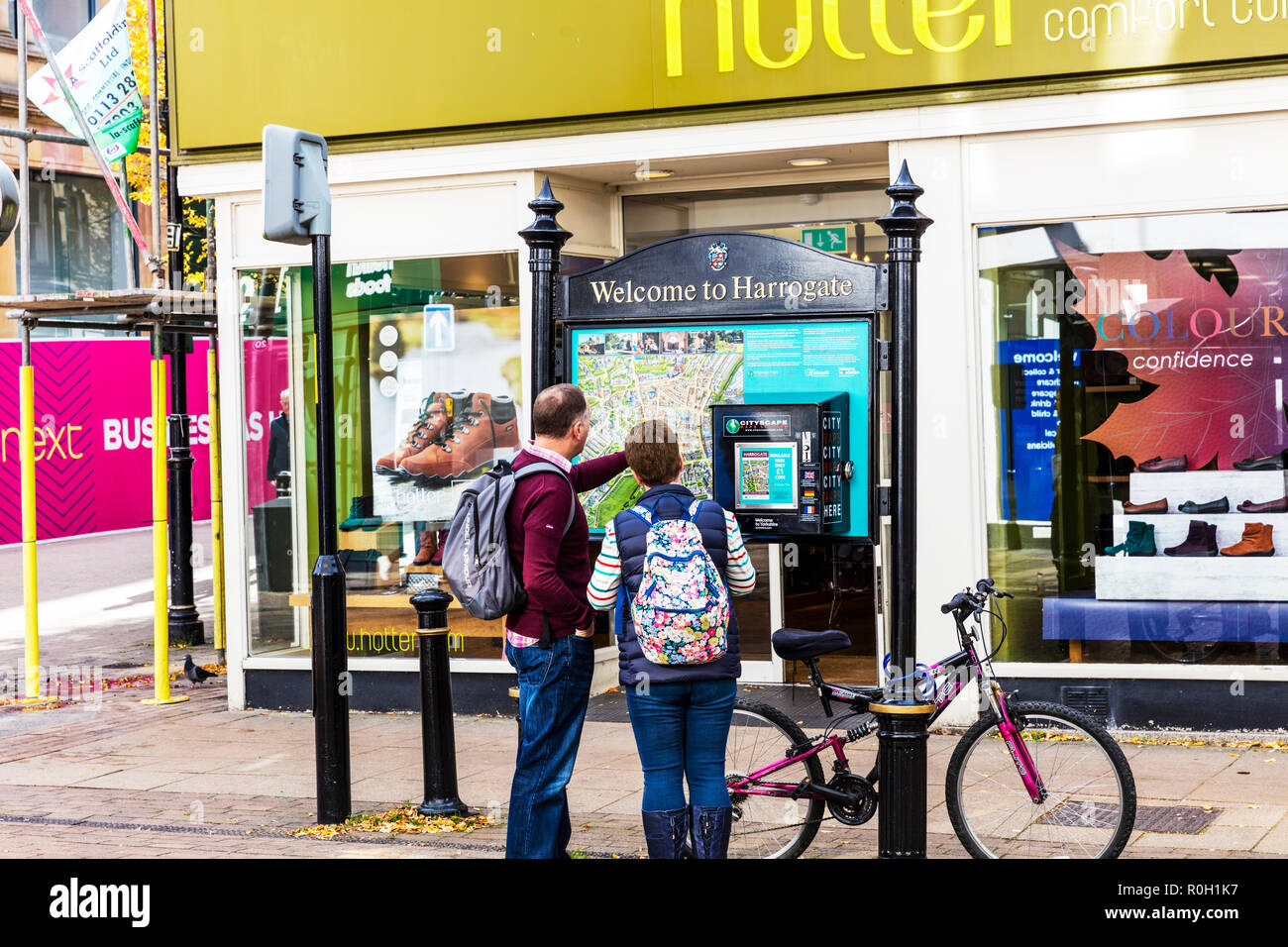 Harrogate town Centre, Yorkshire UK England, Welcome to Harrogate sign, City maps Harrogate, Looking at city map, working out directions, Harrogate UK Stock Photo