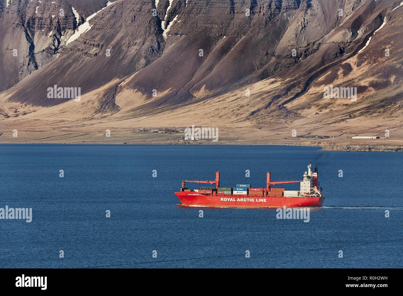 Container ship arriving Stock Photo