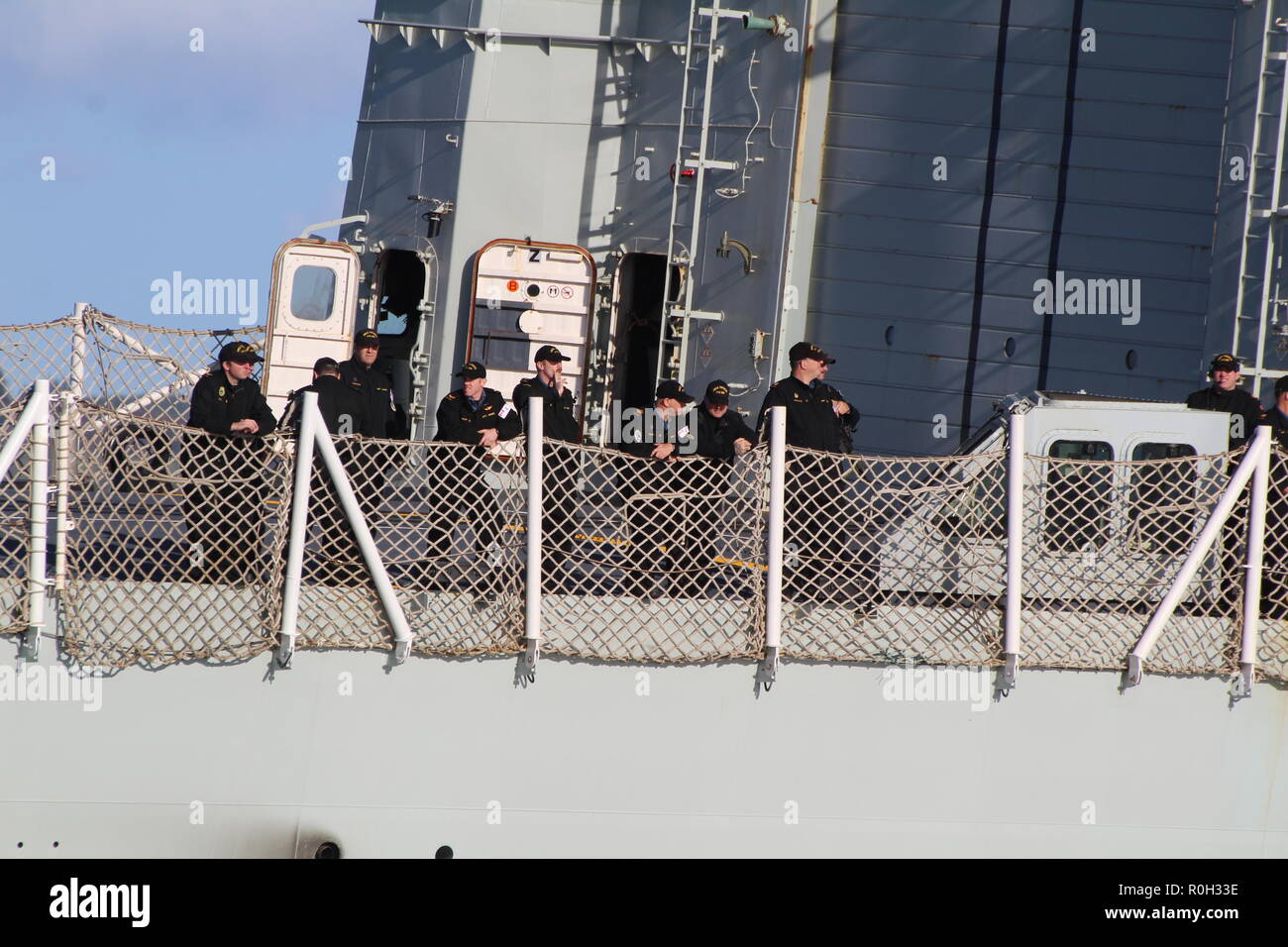 Sailors on board the Royal Canadian Navy's Halifax-class frigate HMCS Toronto FFH-330, as the vessel passes Greenock on an inbound journey to Glasgow. Stock Photo