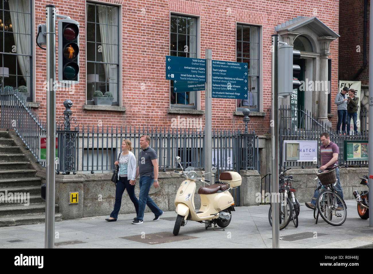 Scooter, Signpost and Tourists; Dublin; Ireland Stock Photo Alamy