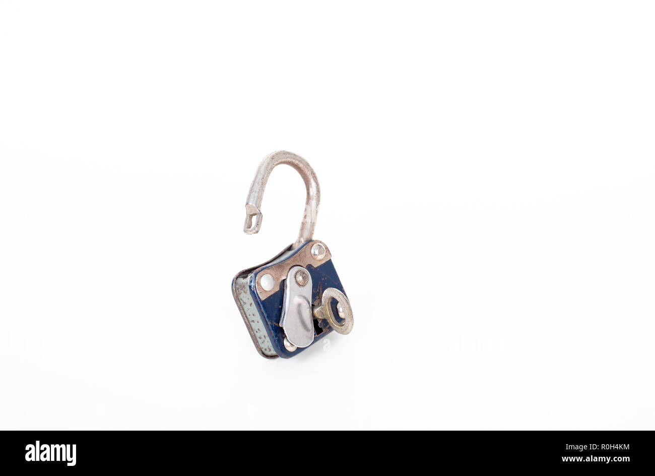 Vintage rusty padlock and key isolated on white background with copy ...