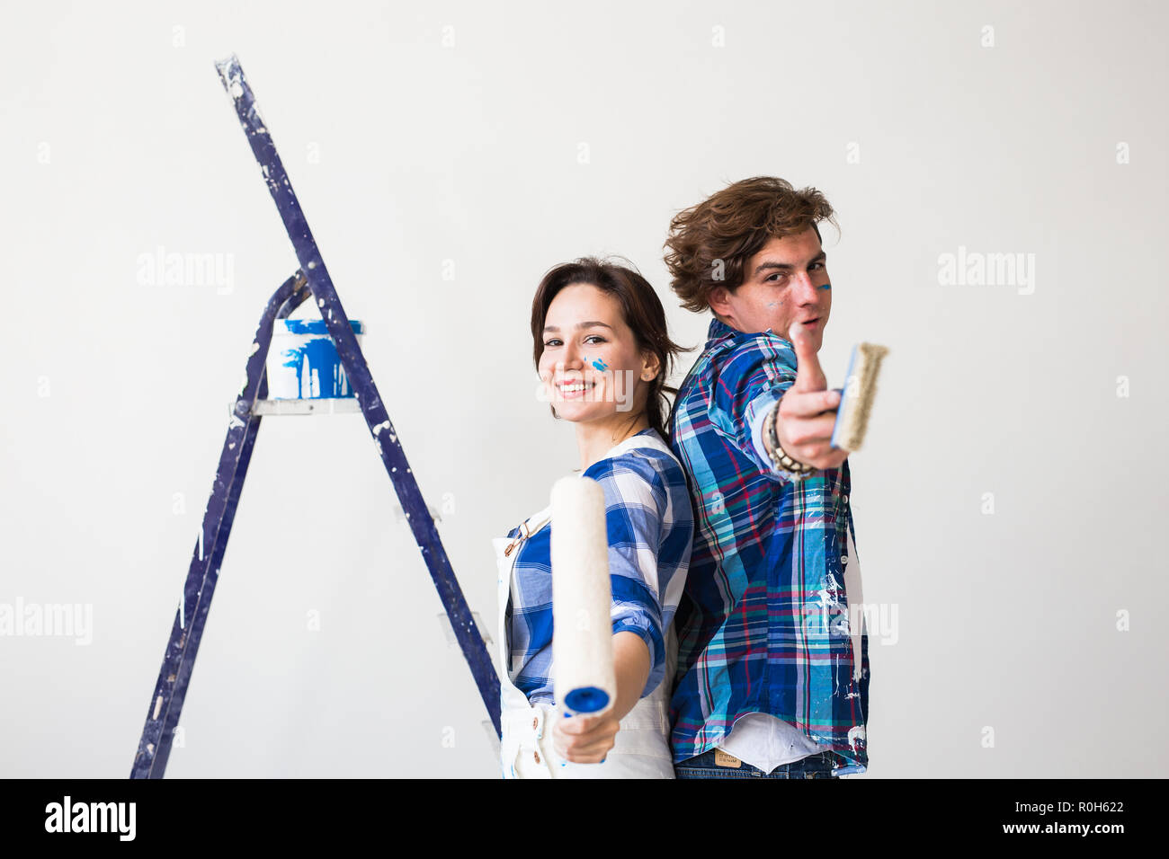 Teamwork, repair and apartment concept - Couple doing renovation at ...