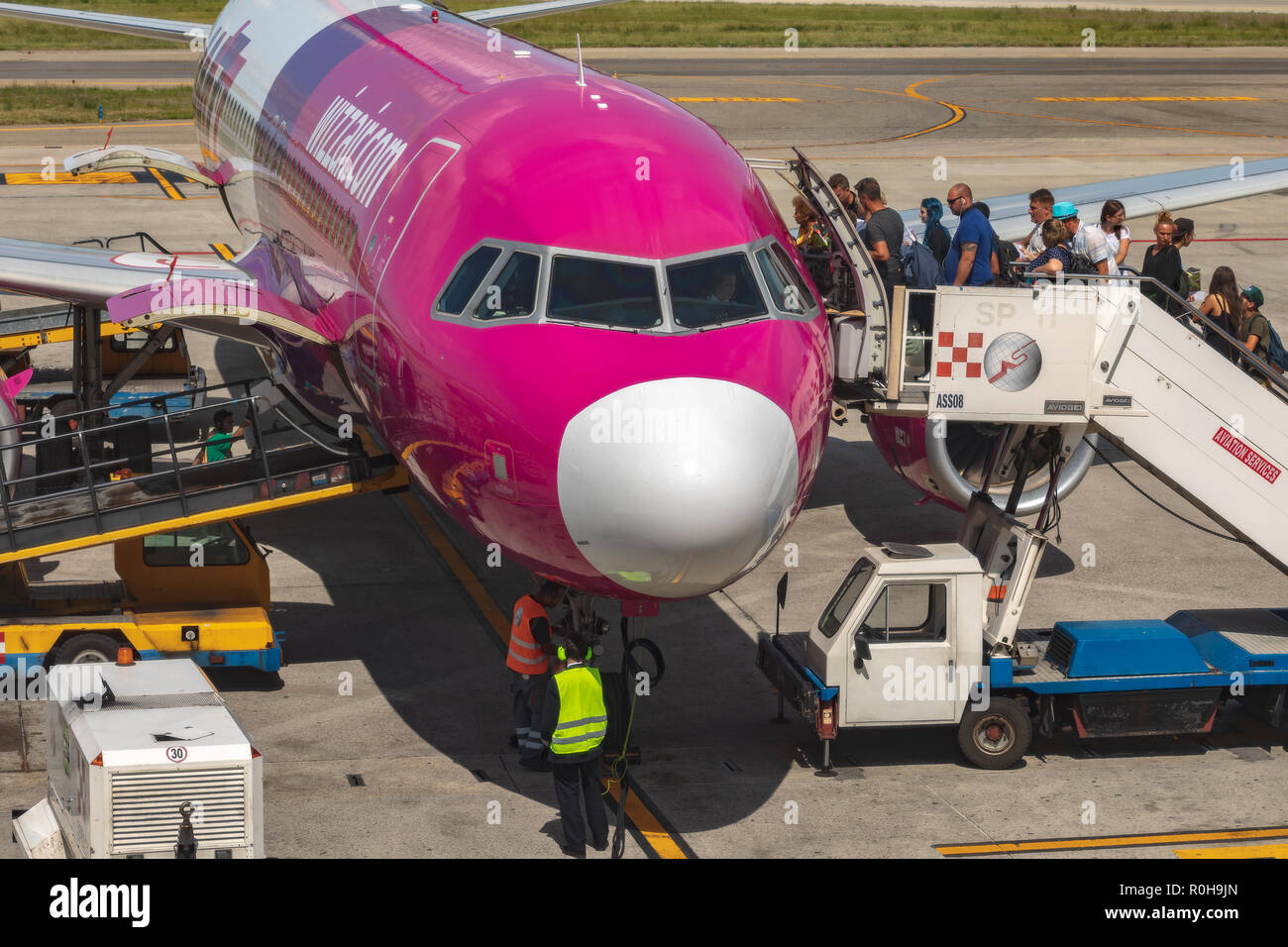 Boarding on wizzair plane on Guglielmo Marconi airport in Bologna Italy