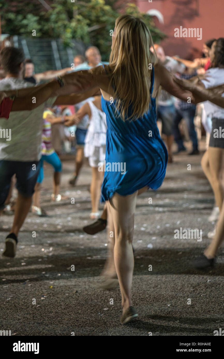 Swinging In A Blue Dress Stock Photo - Alamy