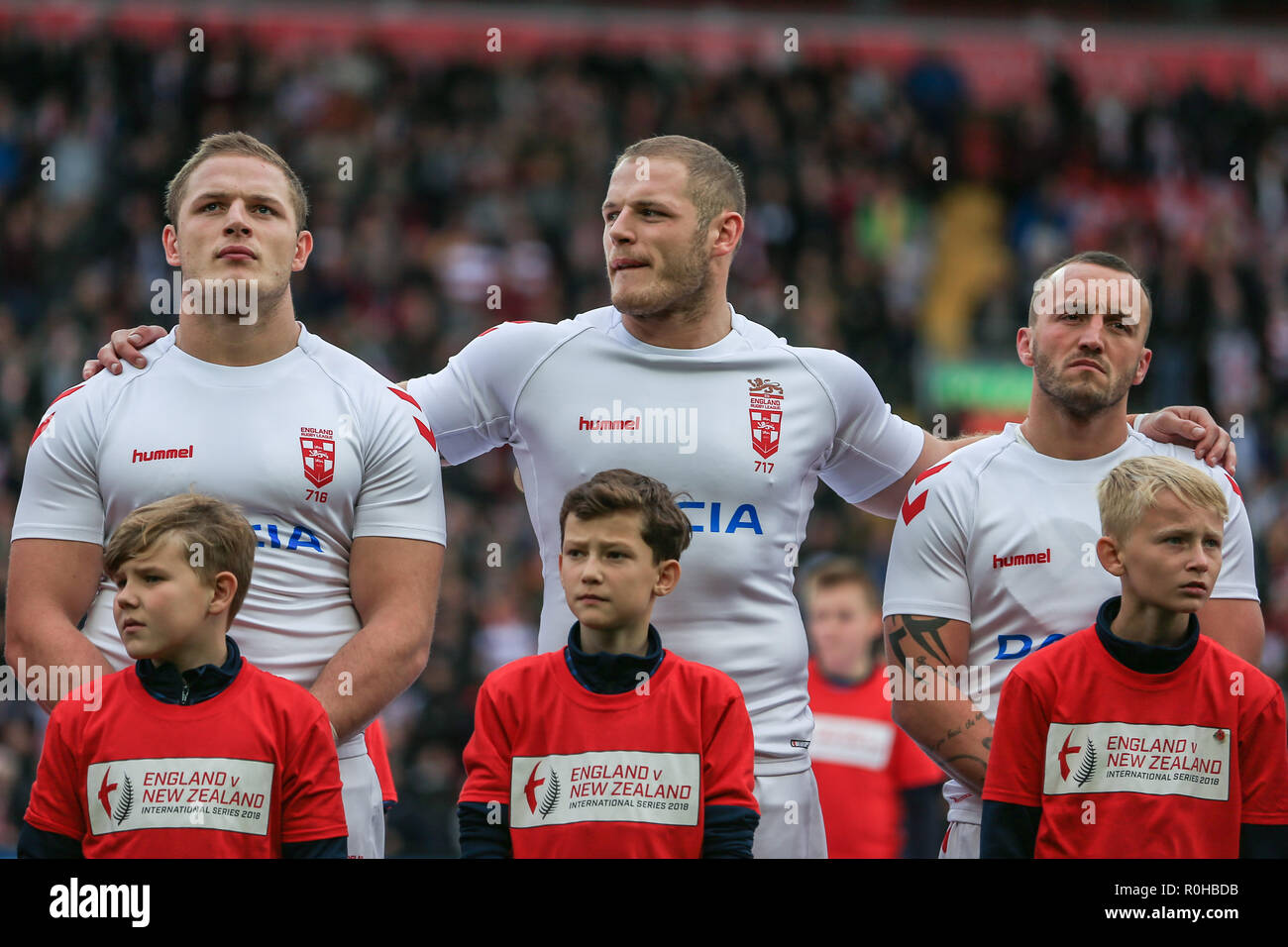 4th November, Anfield, Liverpool, England ; Rugby League International Test Match , England v New Zealand ; Tom Burgess of England (C) put his arms around George Burgess of England (R) and