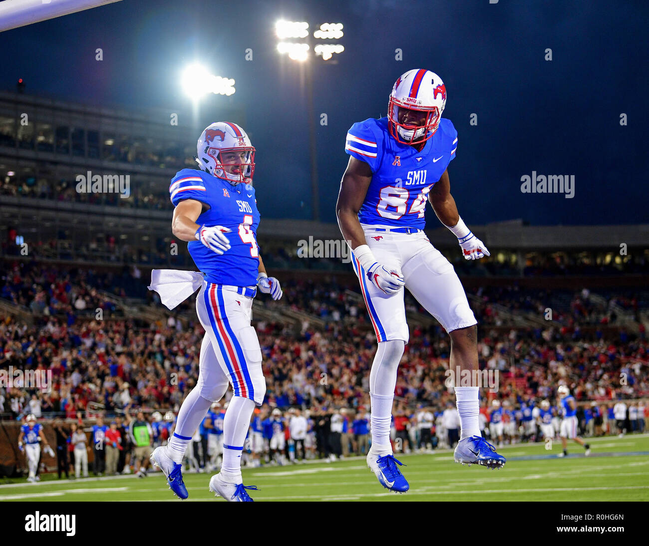 Southern Methodist Mustangs wide receiver Tyler Page (4) catches a pass for a touchdown as he celebrates with Southern Methodist Mustangs wide receiver Judah Bell (84) during the Houston Cougars at SMU Mustangs at an NCAA Football game at the Gerald J. Ford Stadium, Dallas Texas. 11/03/2018.Manny Flores/Cal Sport Media) Stock Photo