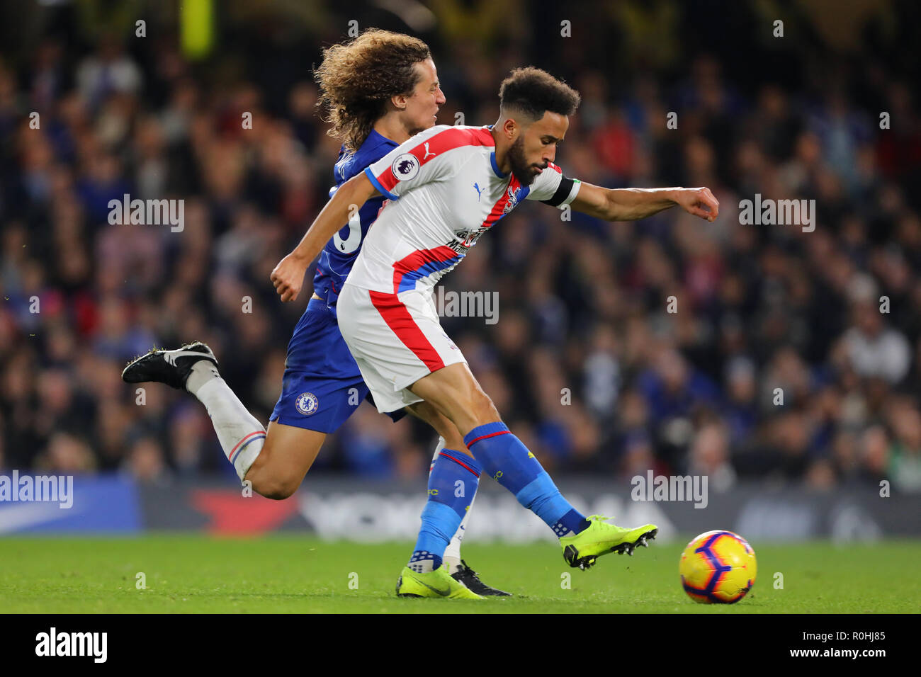Andros Townsend of Crystal Palace scores the equalising goal, making it 1-1 - Chelsea v Crystal Palace, Premier League, Stamford Bridge, London - 4th November 2018  STRICTLY EDITORIAL USE ONLY - DataCo rules apply - The use of this image in a commercial context is strictly prohibited unless express permission has been given by the club(s) concerned. Examples of commercial usage include, but are not limited to, use in betting and gaming, marketing and advertising products. No use with unauthorised audio, video, data, fixture lists, club and or league logos or services including those listed as  Stock Photo