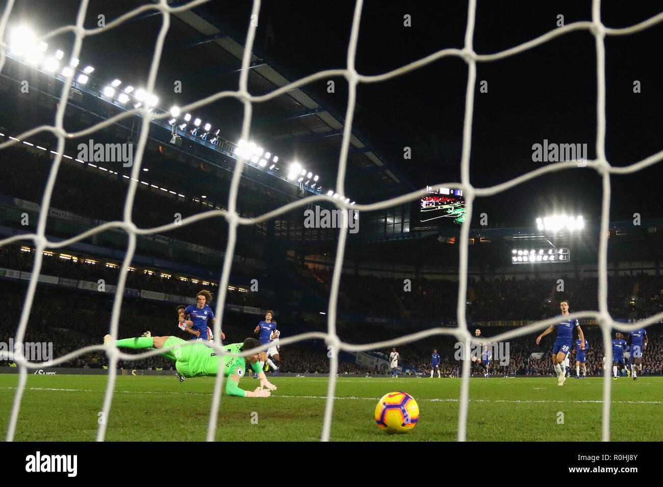 Andros Townsend of Crystal Palace scores the equalising goal, making it 1-1 - Chelsea v Crystal Palace, Premier League, Stamford Bridge, London - 4th November 2018  STRICTLY EDITORIAL USE ONLY - DataCo rules apply - The use of this image in a commercial context is strictly prohibited unless express permission has been given by the club(s) concerned. Examples of commercial usage include, but are not limited to, use in betting and gaming, marketing and advertising products. No use with unauthorised audio, video, data, fixture lists, club and or league logos or services including those listed as  Stock Photo