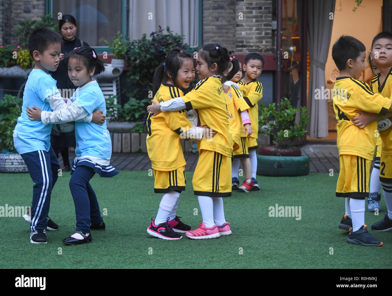 Hangzhou China S Zhejiang Province 5th Nov 18 Children Pair Up To Compete In A Ball Carrying Game During A Recreational Sports Event At A Kindergarten In Hangzhou East China S Zhejiang Province Nov 5 Hangzhou China S Zhejiang Province 5th Nov 18 Children Pair Up To Compete In A Ball Carrying Game During A Recreational Sports Event At A Kindergarten In Hangzhou East China S Zhejiang Province Nov 5
