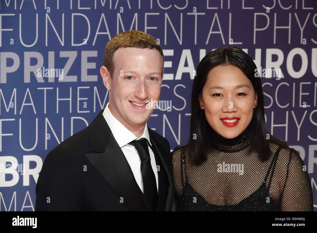 San Francisco, USA. 4th Nov, 2018. Founder and CEO of Facebook Mark Zuckerberg (L) and his wife Priscilla Chan attend the awarding ceremony of the 2019 Breakthrough Prize in San Francisco, the United States, on Nov. 4, 2018. The Breakthrough Prize Foundation held a grand gala Sunday night in northern California to award a total of 21 million U.S. dollars worth of prizes to the world's top scientists for their remarkable achievements in fundamental physics, life sciences, and mathematics. Credit: Wu Xiaoling/Xinhua/Alamy Live News Stock Photo