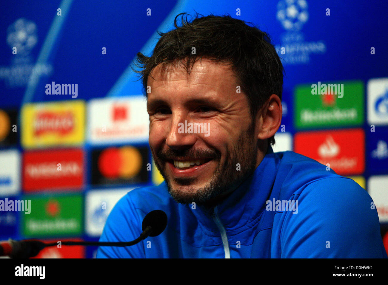 London, UK. 5th Nov 2018. PSV Eindhoven Manager Mark van Bommel cracks a smile during the team press conference. PSV Eindhoven FC team press conference, UEFA Champions league, at Wembley Stadium in London on Monday 5th November 2018. the team are preparing ahead of tomorrow's match against Tottenham Hotspur. this image may only be used for Editorial purposes. Editorial use only, license required for commercial use. No use in betting, games or a single club/league/player publications . pic by Steffan Bowen/Andrew Orchard sports photography/Alamy Live news Stock Photo