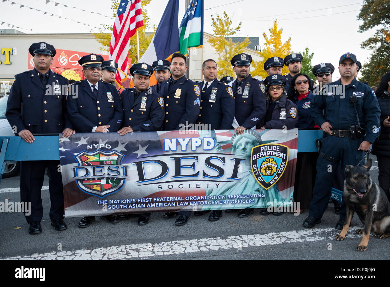 A group of South Asian American policemen, the NYPD DESI SOCIETY pose for a photo at the Diwali celebration in South Richmond Hill, Queens, New York. Stock Photo
