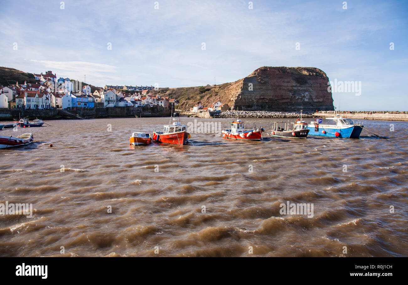 The choppy waters in the harbour at Staithes,North Yorkshire,England,UK Stock Photo