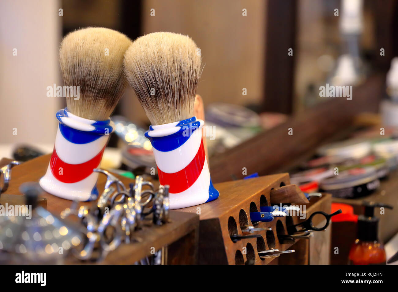 Shaving accessories in barber shop and empty space for text Stock Photo