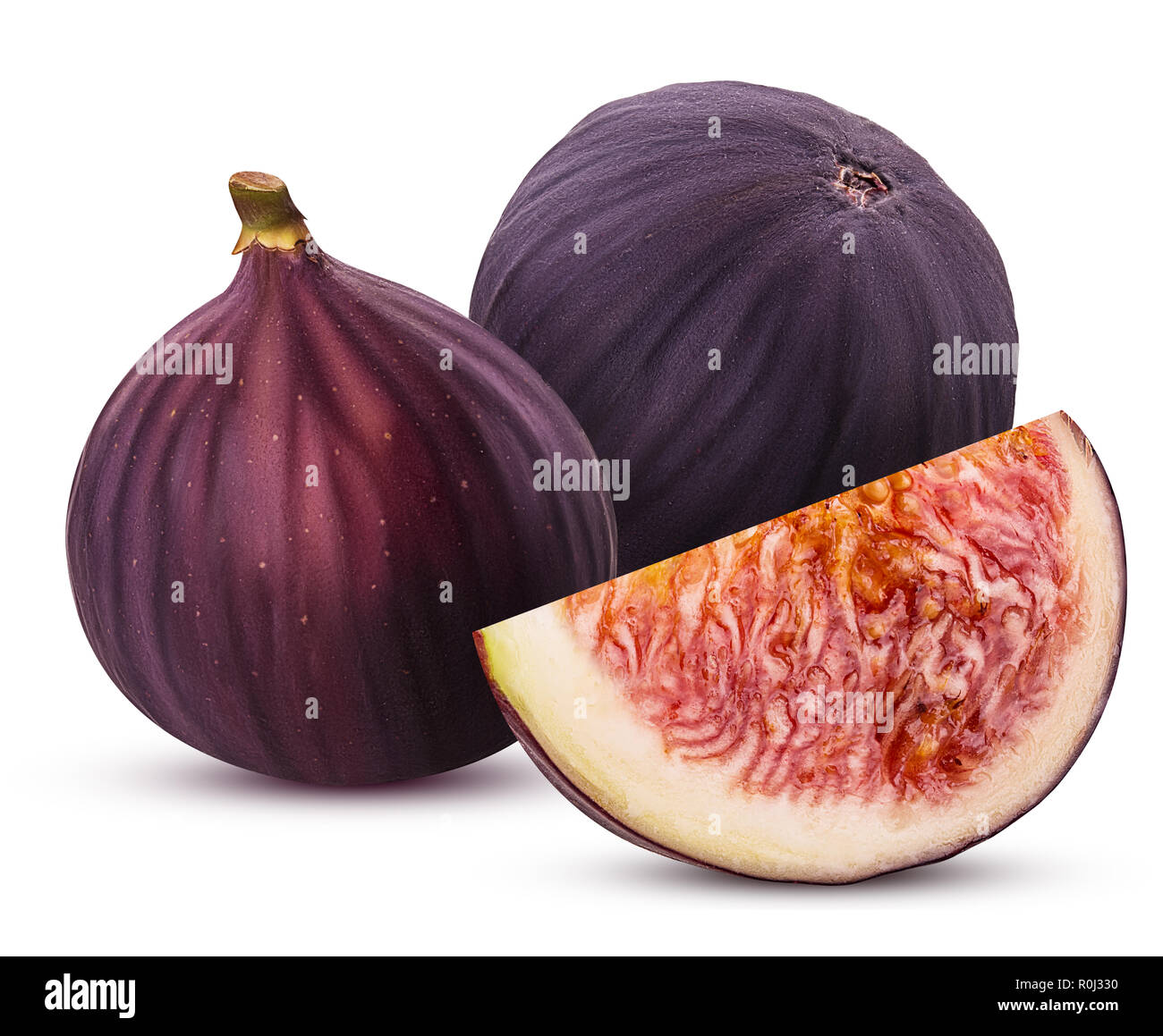 Two fresh figs fruit and slice isolated on white background. Clipping Path. Full depth of field. Stock Photo