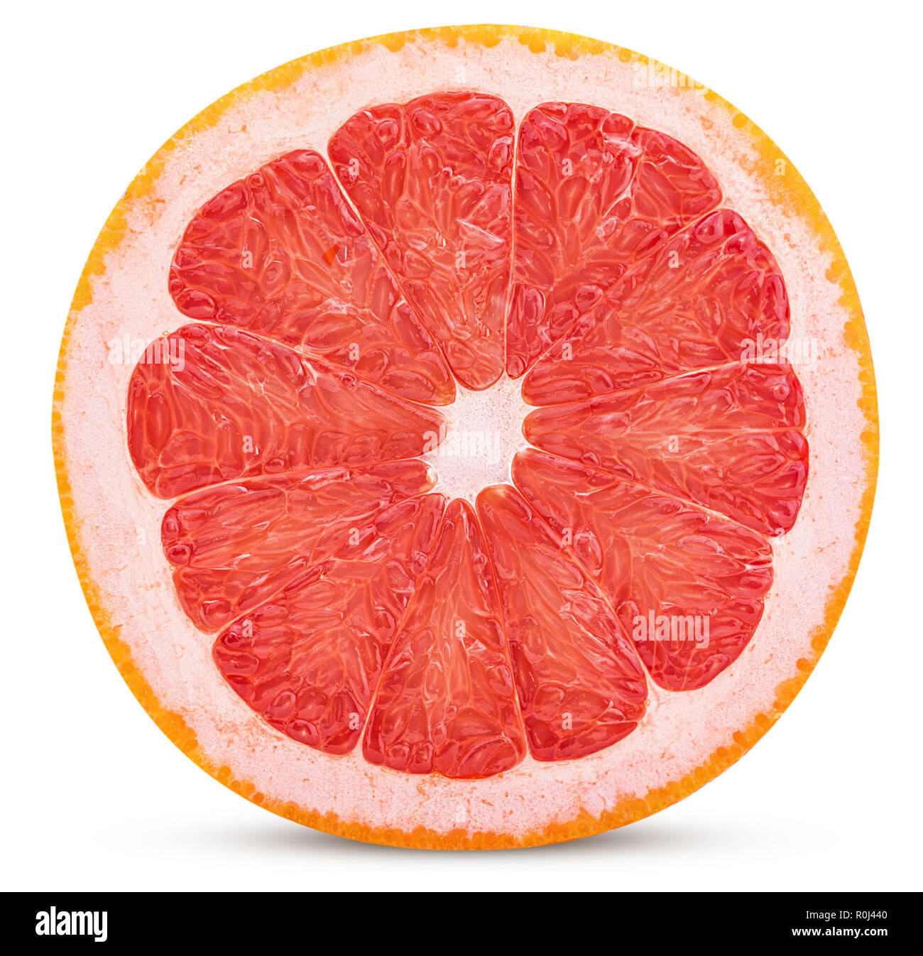 Grapefruit citrus fruit cut in half isolated on white background