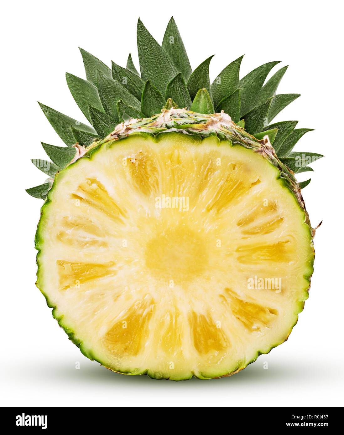 Pineapple fruit cut in half isolated on white background. Clipping Path ...